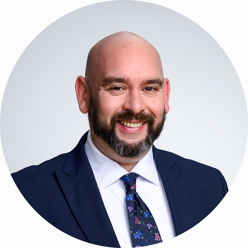 Business headshot of Kalman, London studio with a clean white backdrop