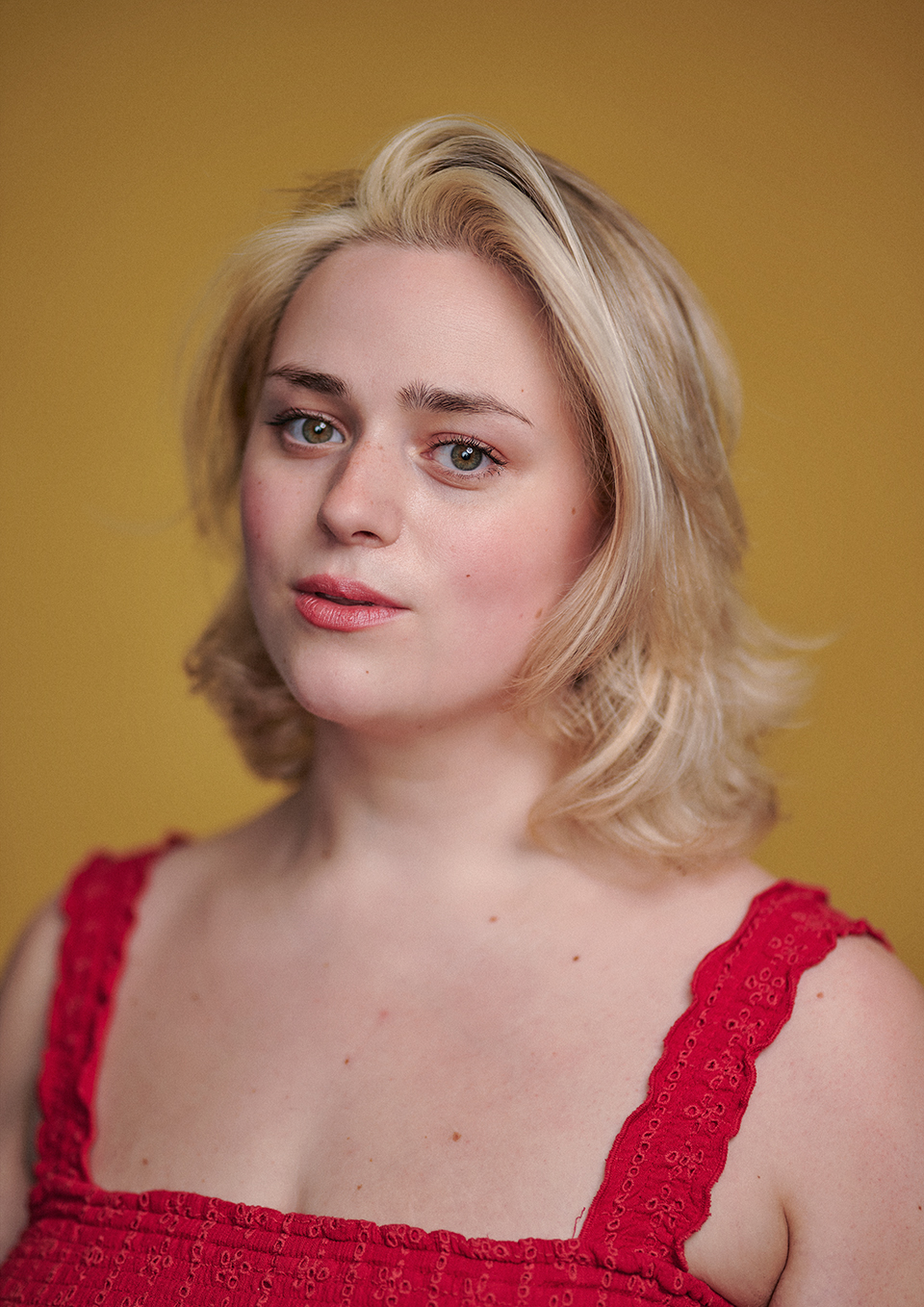 Actor headshot of Mary Timbrell-Hill with a green canvas backdrop, London studio