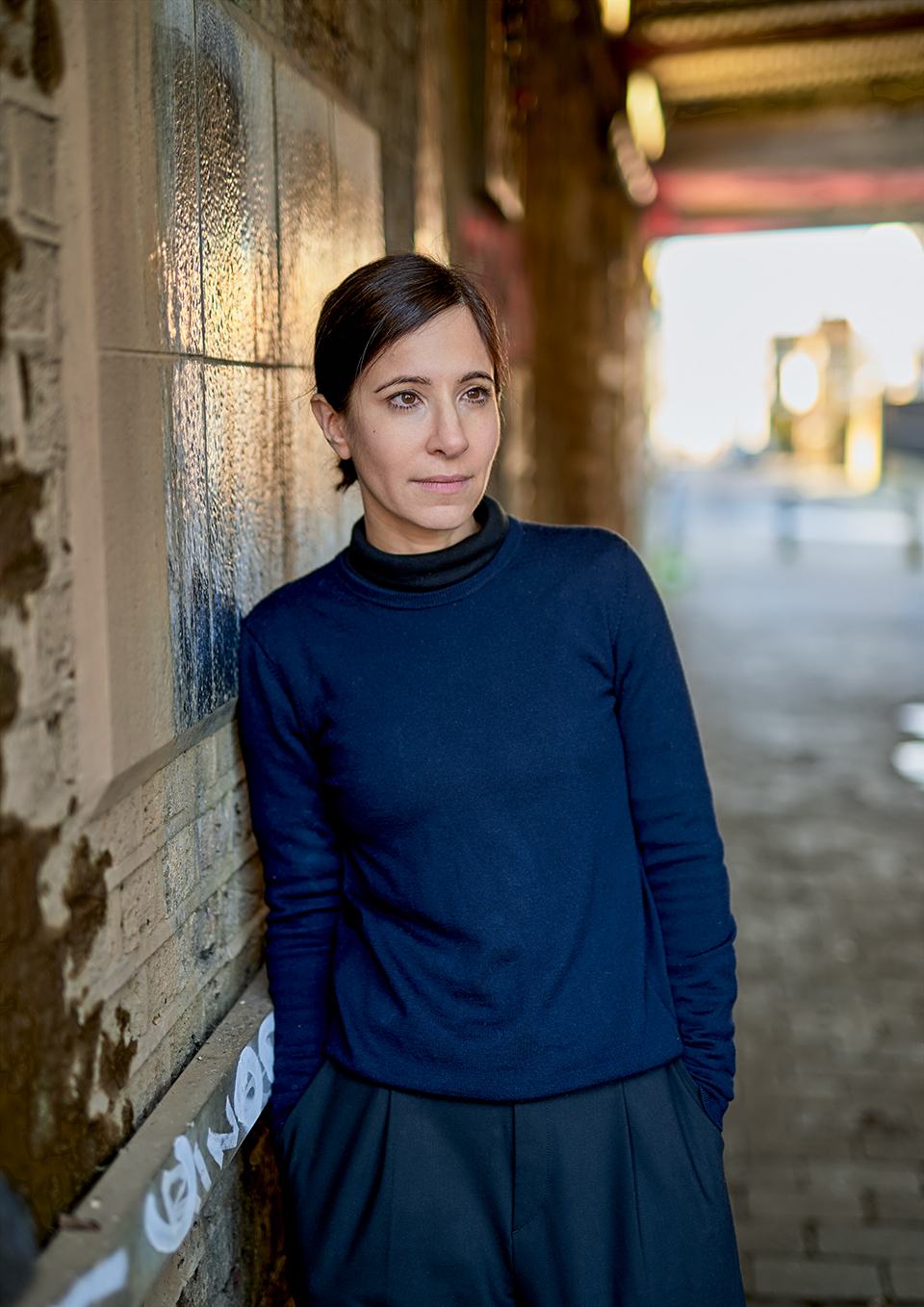Author portrait of Melissa Franklin in a London bar with natural light