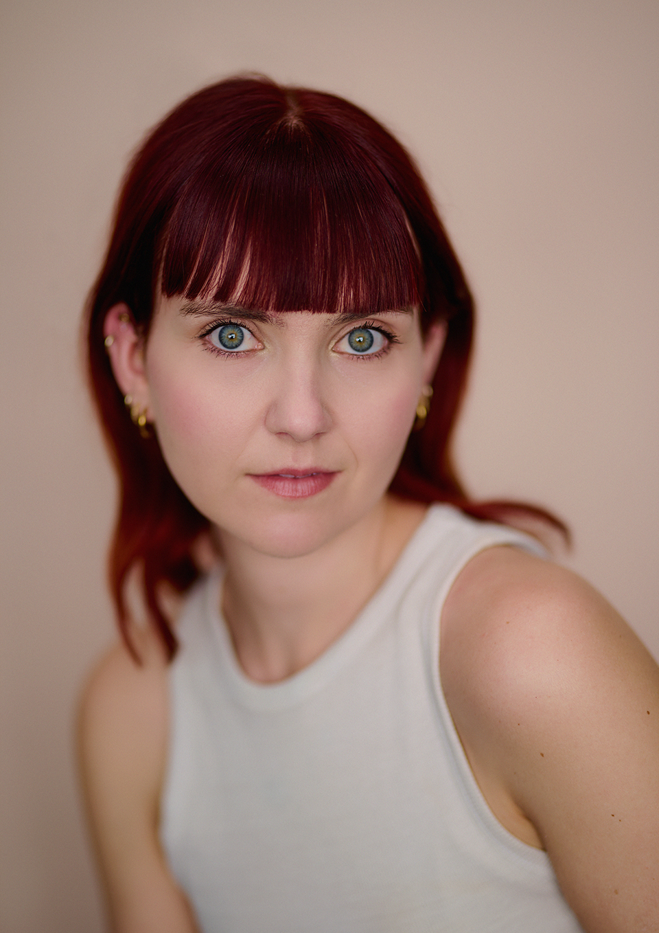 Studio actor headshot of Tess Hermann, London