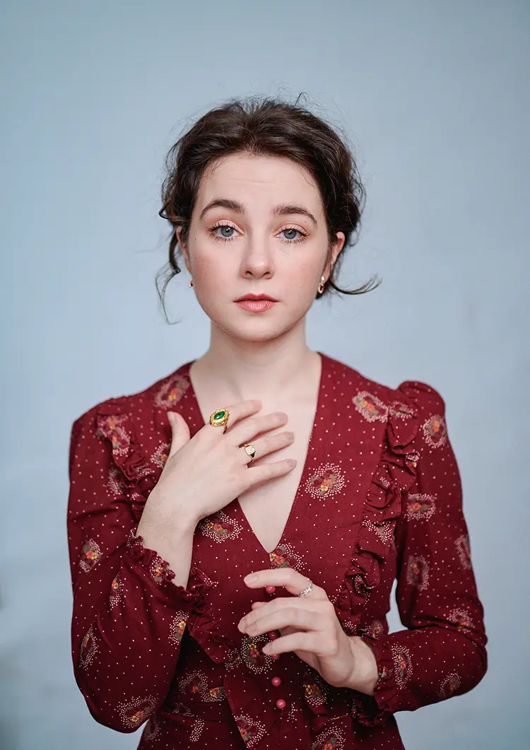 Maeve Anne Allen cinematic actor portrait on soft blue background