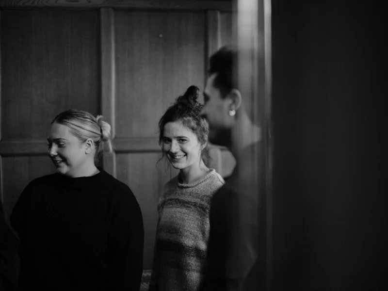 Behind the scene of actors and crew on film set