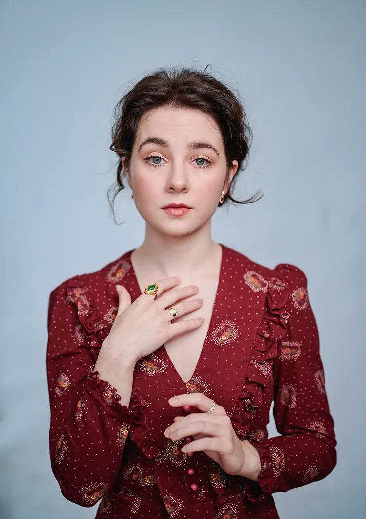 Maeve Anne Allen cinematic actor portrait on soft blue background