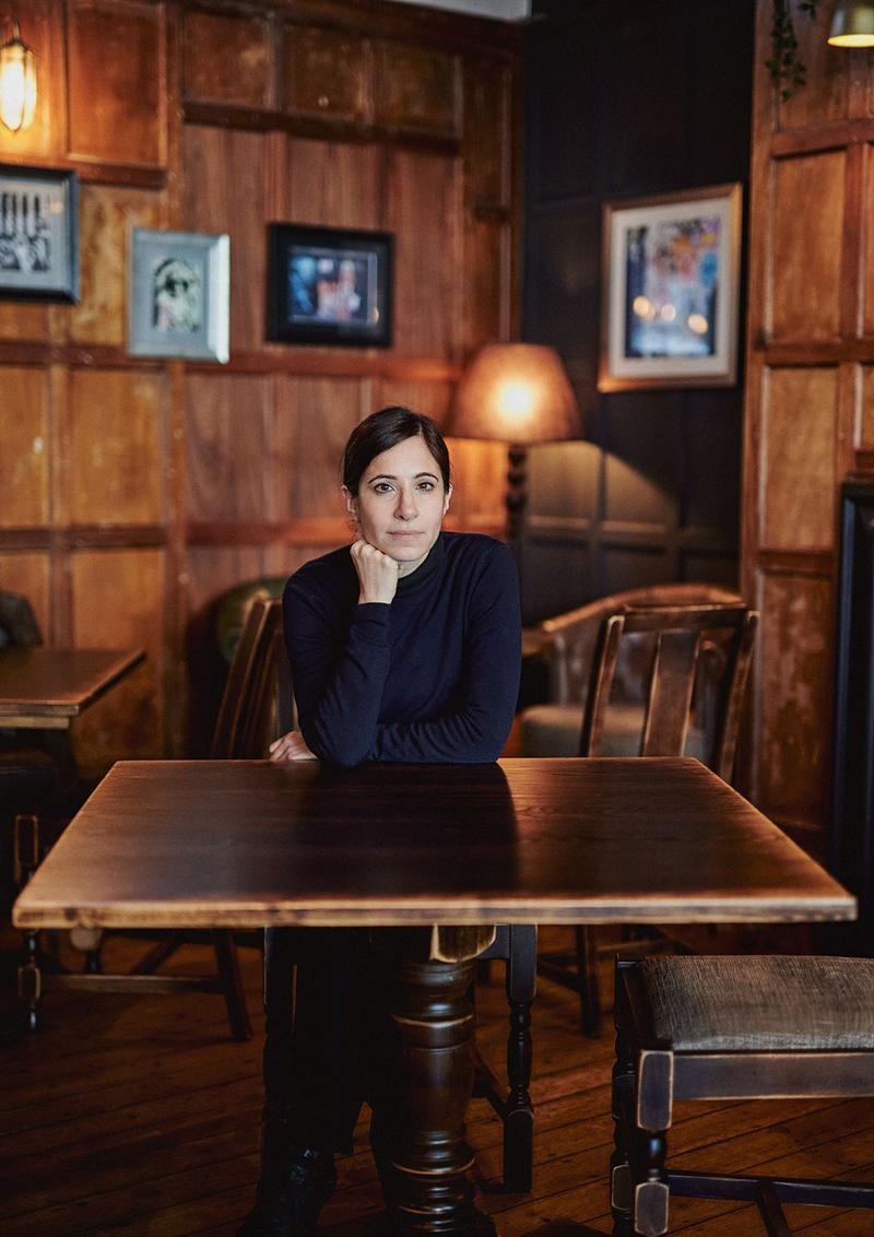 Melissa Franklin Natural Light Author Portrait in a bar.