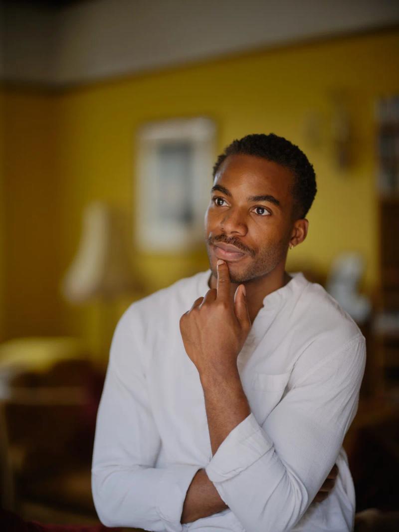 Portrait of an actor in character between takes on a film set