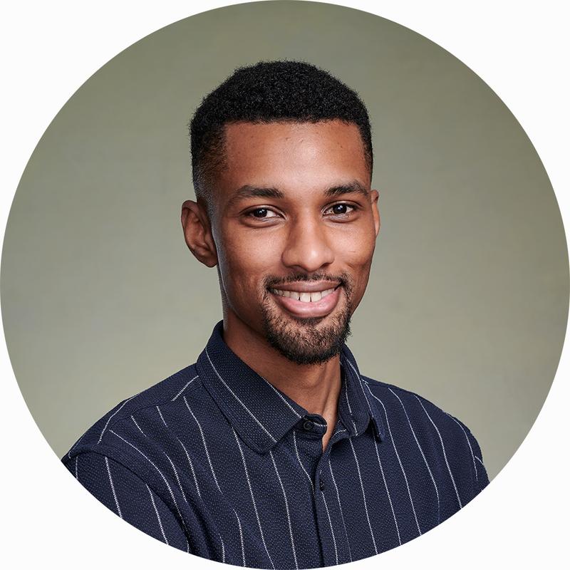 LinkedIn Headshot of businessman in my London studio with clean professional lighting and a green backdrop.