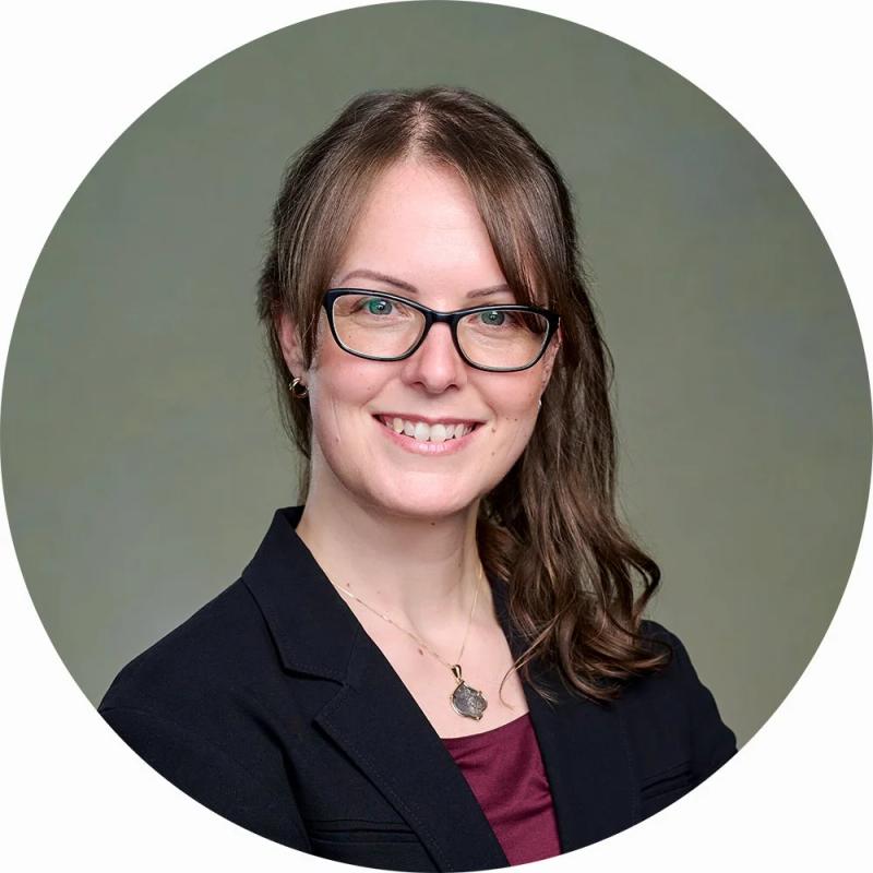 LinkedIn headshot with green canvas backdrop
