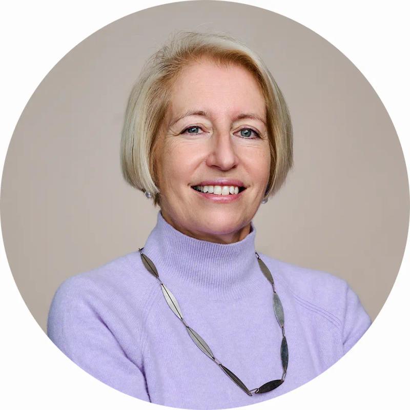 Professional LinkedIn headshot of Georgie in my London studio with a pink canvas backdrop