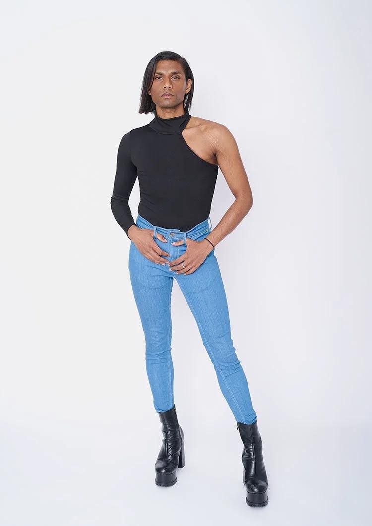 Male model polaroids London full length front view skinny jeans and black top